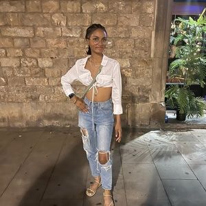 Distressed denim jeans